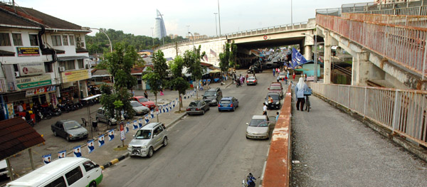 View of Pantai Dalam from the motorcycle bridge over the KTM track.